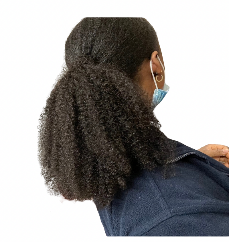 Woman wearing 18 inch Virgin Afro Kinky Curly Drawstring Ponytail blending with natural Type 4c hair